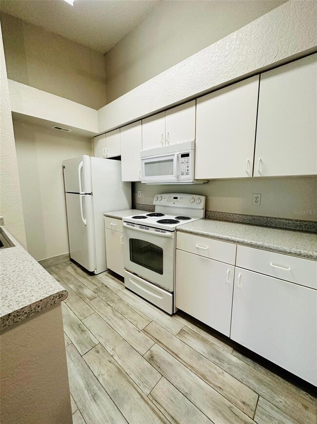 2226 Metropolitan Way unit 211, Orlando, FL 32839 - photo 6