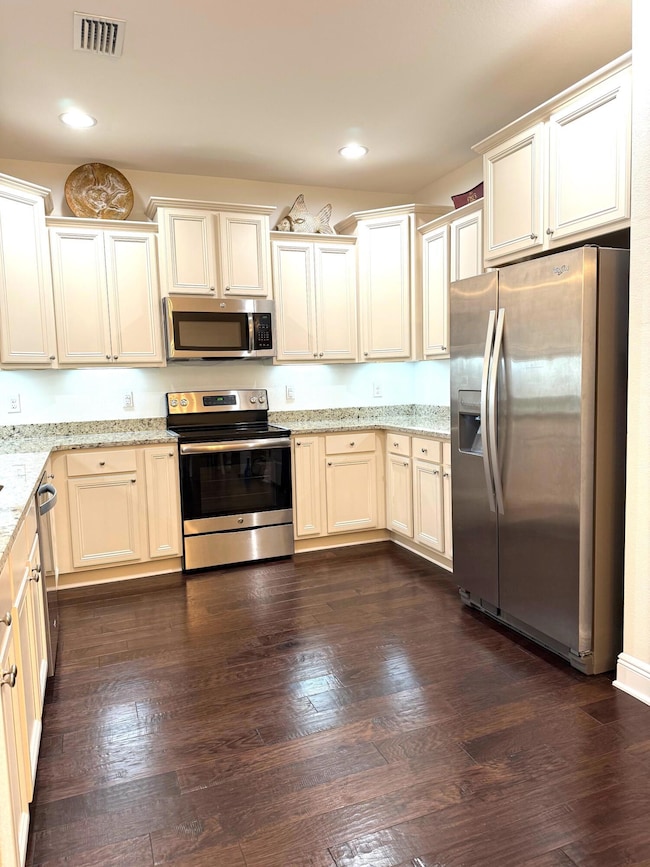 kitchen has hardwood flooring