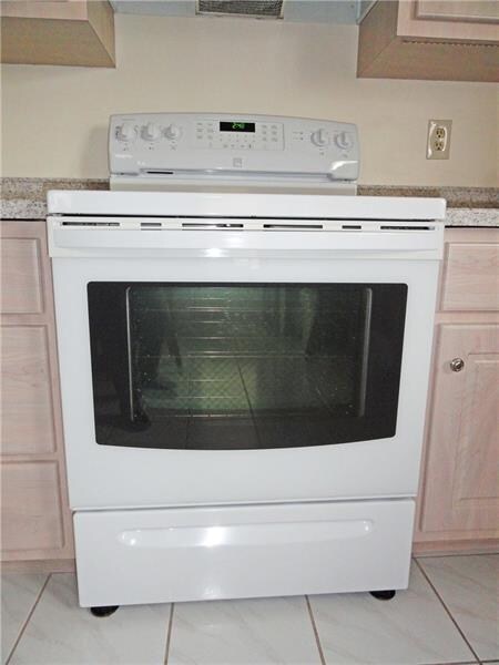 New convection oven with warming burner