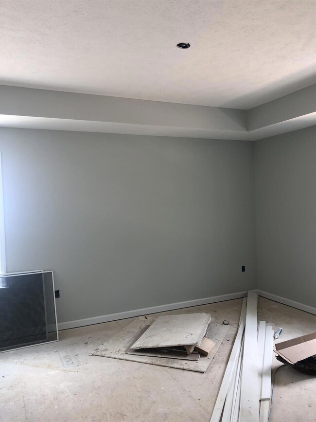 Master bedroom has tray ceilings. 