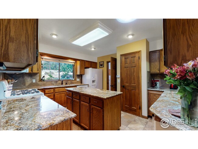 Granite counters, pantry, gas stove - what else could you want?