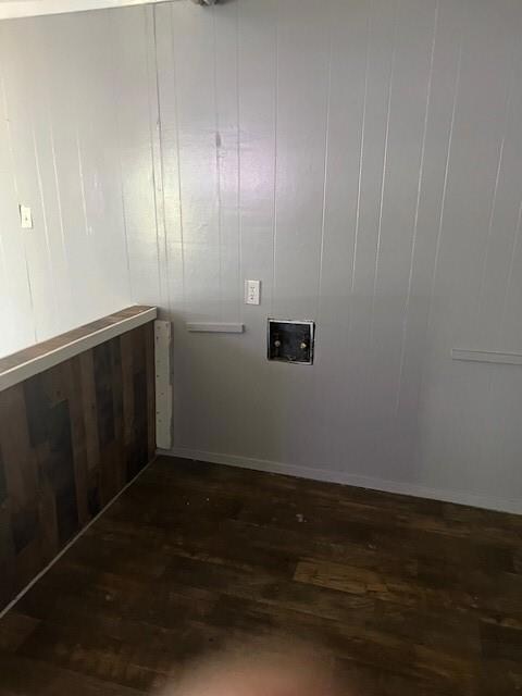 Laundry room with dark wood-style floors