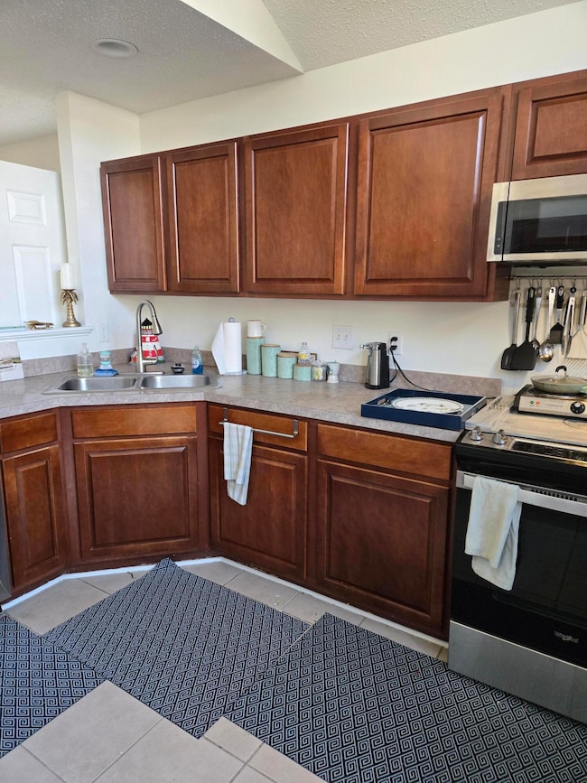 Kitchen has lots of cabinets