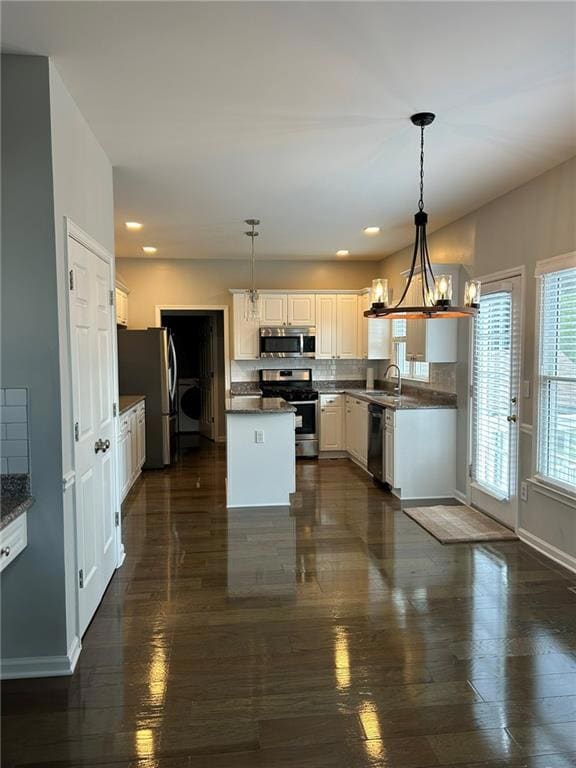 Kitchen with appliances with stainless steel finis