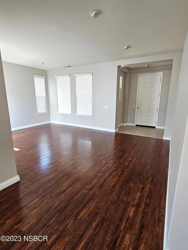 LIVING ROOM AND FOYER