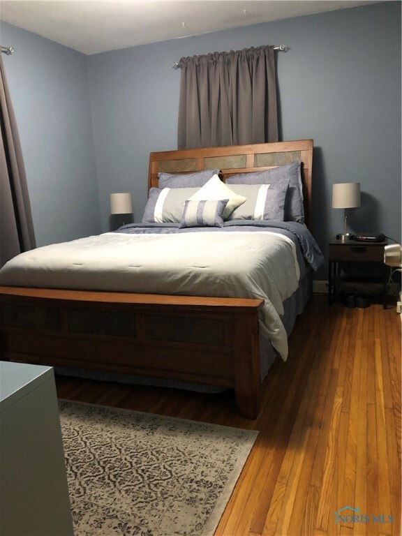 Master bedroom with original hardwood floors