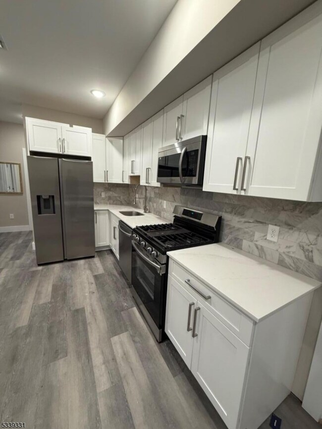 1022 Main St unit 407, Paterson, NJ 07503 - photo 3