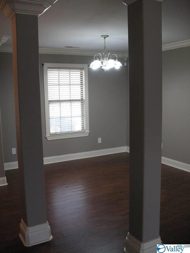 Twin columns framing Formal Dining area