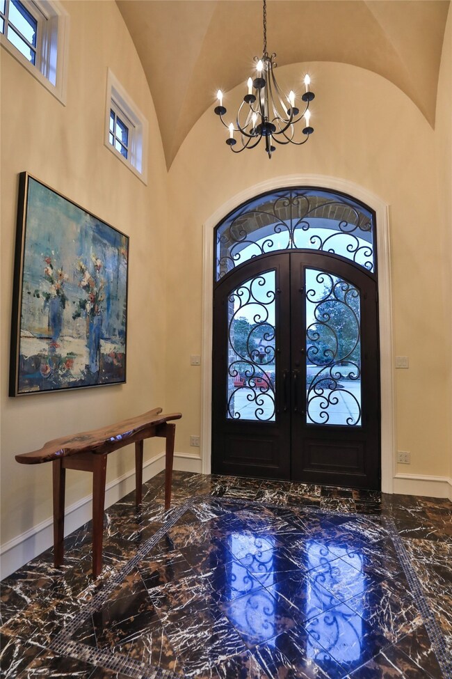 Marble floor and dramatic a groin ceiling will greet you upon entry