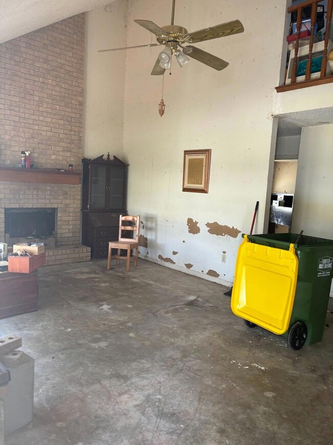 Living room featuring high vaulted ceiling, ceilin