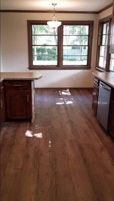 Kitchen has an eat in area for breakfast table