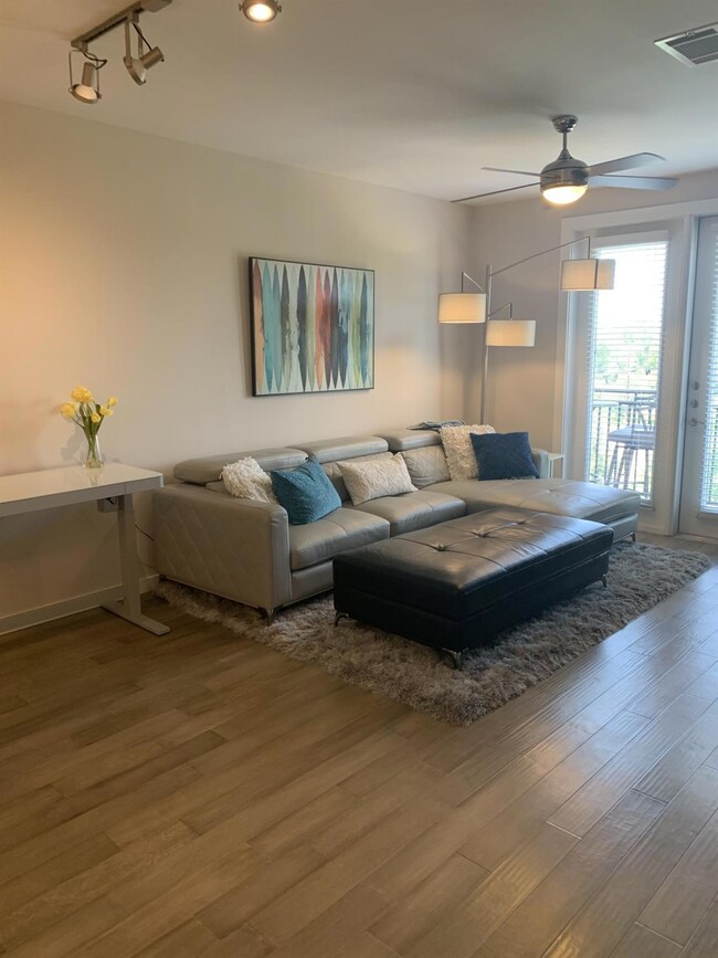 Living room featuring wood finished floors and a 