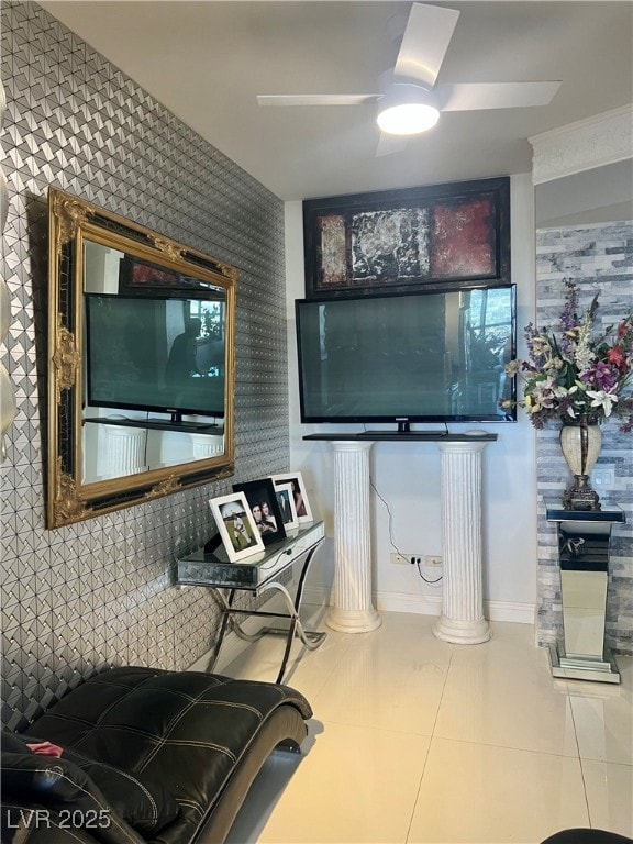Bathroom with wallpapered walls, ceiling fan, and