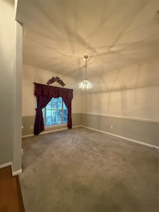 Upon entrance, the formal dining room on the left side.