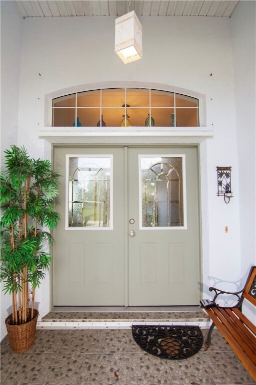 STAINED GLASS FRONT DOOR PANEL AND LIVING ROOM WIN