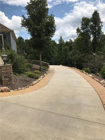 PLENTY OF PARKING. LEADS TO BASEMENT ENTRANCE