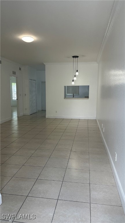 Unfurnished room with light tile patterned floors,
