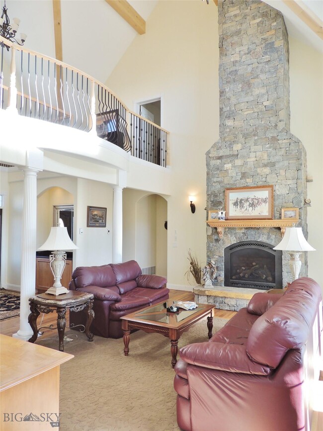 Family room with 2 story gas fireplace