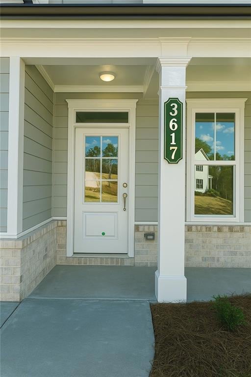 Property entrance with a porch
