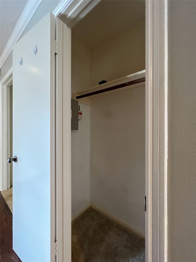 coat closet in hall from entry to bedrooms
