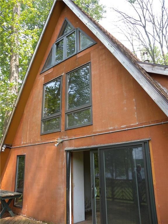 Sliding glass door on lake side of house