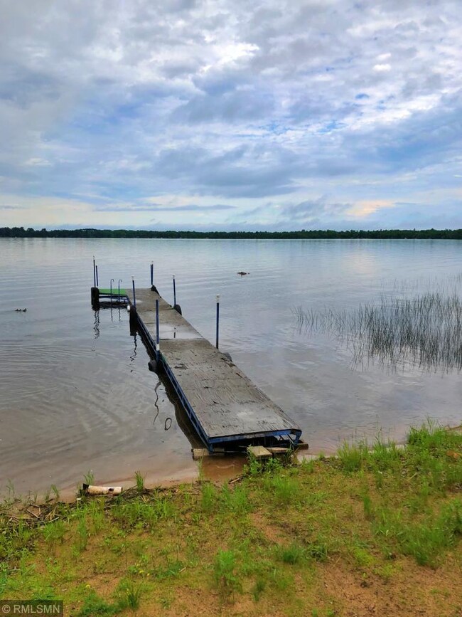 Round Lake Lot with 175ft of sandy lakeshore and d