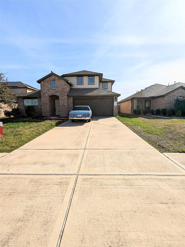 A long four-car driveway