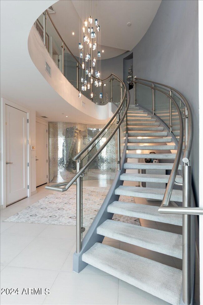 View of stairs:elevator:front door