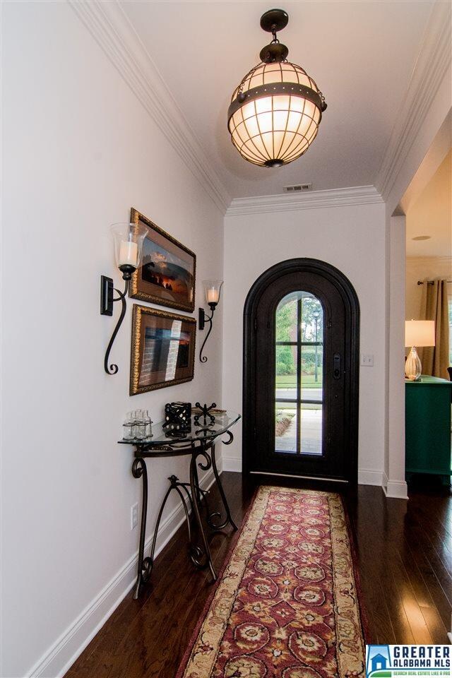 Showcases Bright Foyer and offers security.