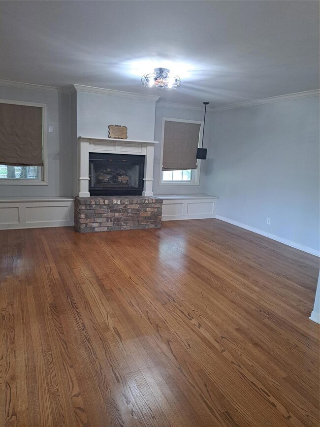 With hardwood floors, fresh paint, new lighting, a
