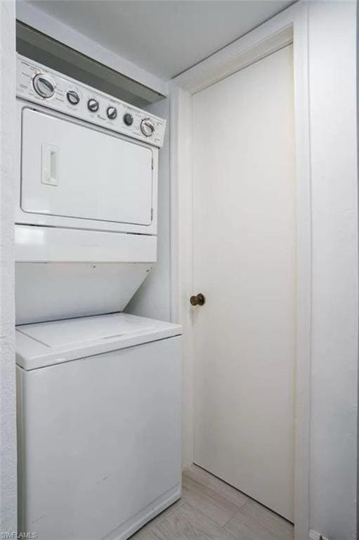 Clothes washing area with stacked washing maching 
