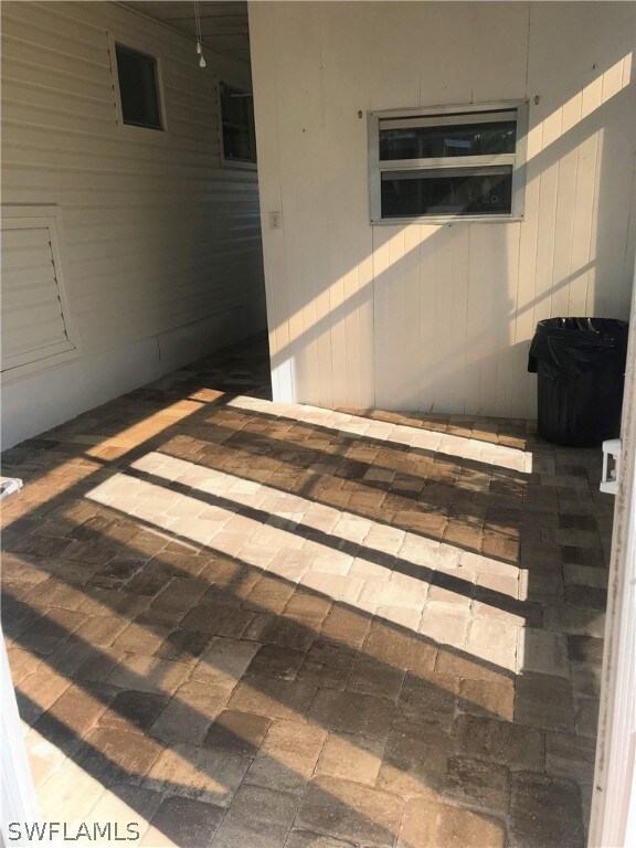 Nice covered and screened outside sitting area