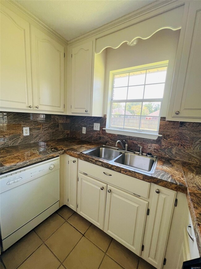 I love a kitchen sink with a window