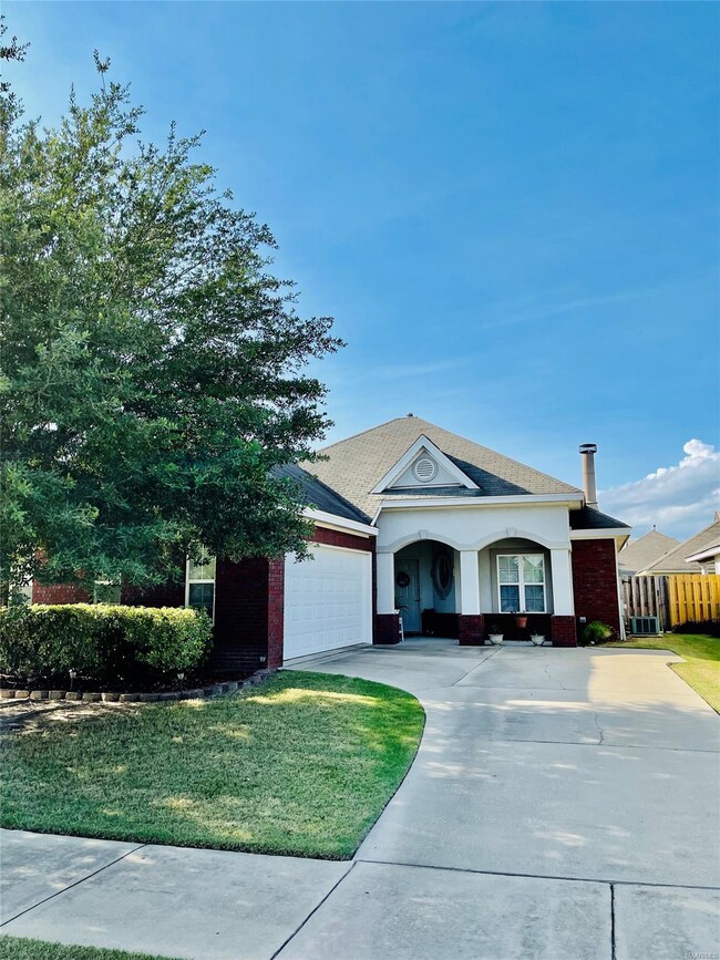 Front of home with a wonderful covered entranceway