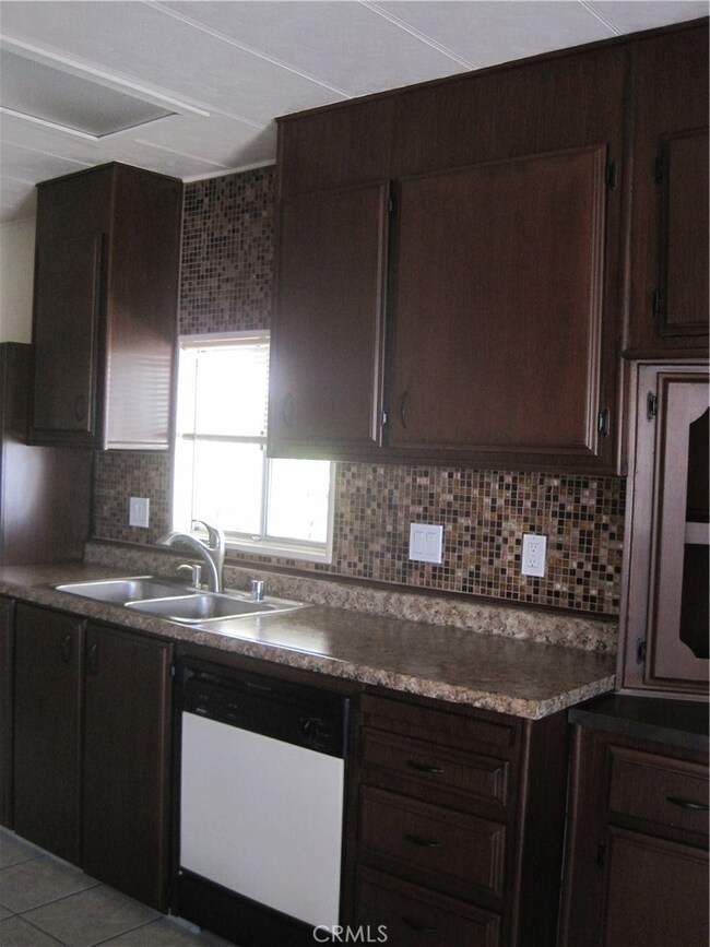 REMODELED KICTCHEN WITH NEW SINK AND FAUSCETS