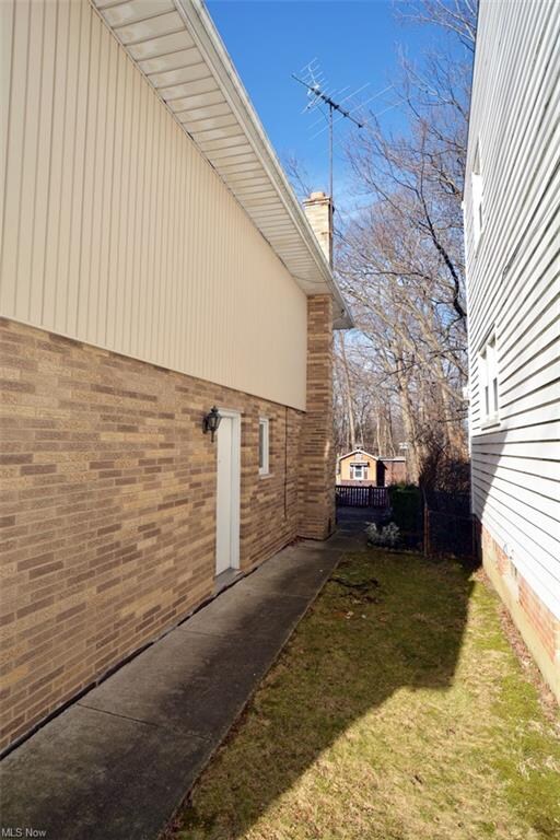Side elevation leading to backyard
