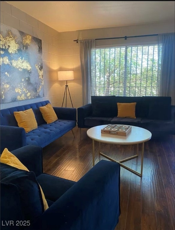 Living area featuring hardwood / wood-style floors