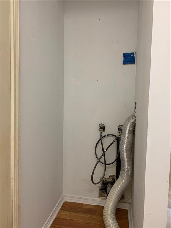 The laundry area is located in the half bath.