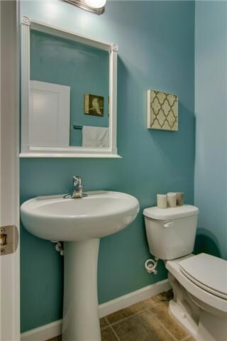 Half bath downstairs just off the front room.