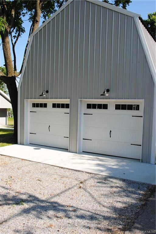 New concrete apron & garage doors