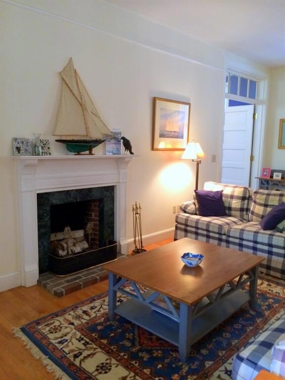 Spacious living area with wood...