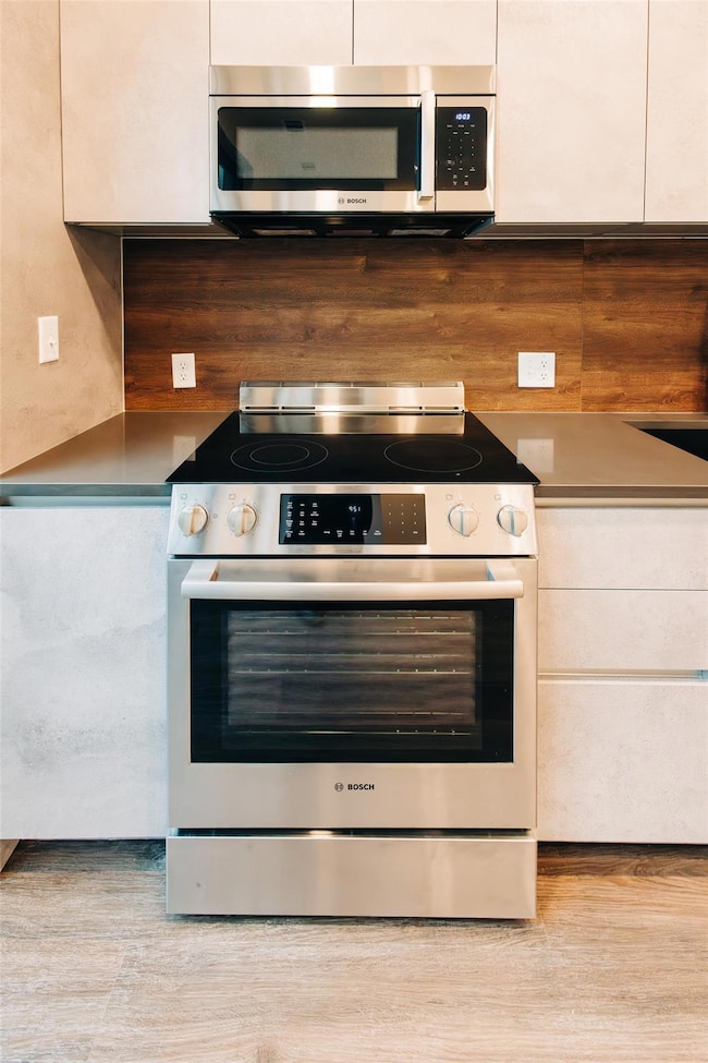 Kitchen with modern cabinets and appliances with 