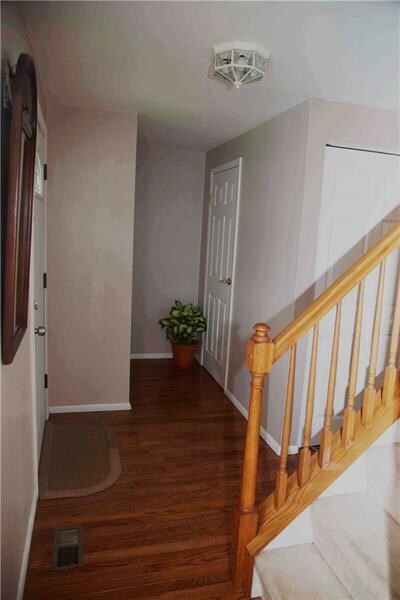 Welcoming front foyer shows off the hardwood, two 