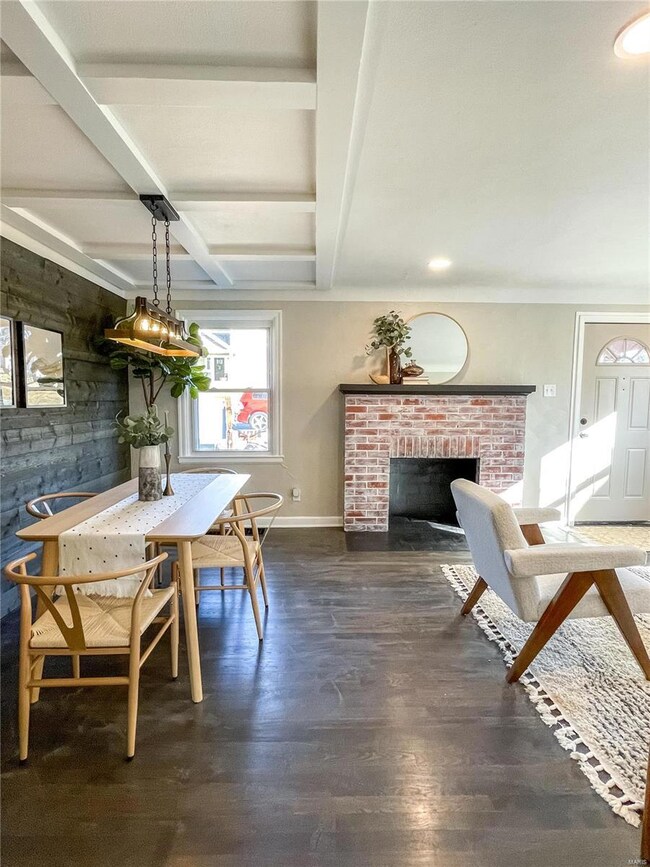 Functional wood burning fireplace for cozy nights with the family.