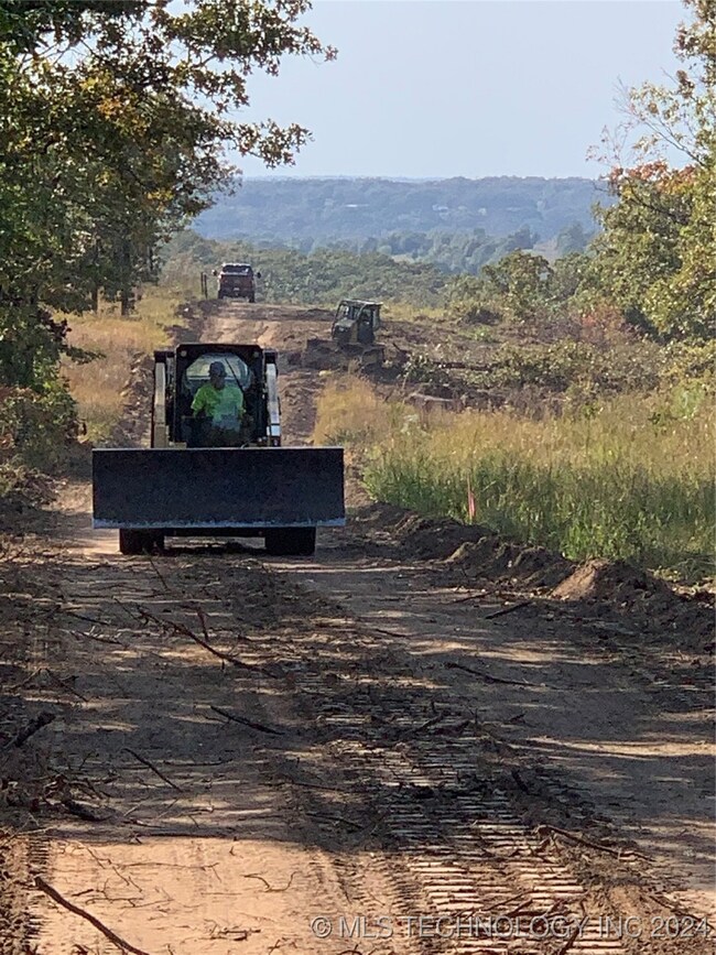 Building the road and pad into the property
