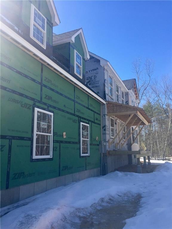 Exterior front, covered porch to be...