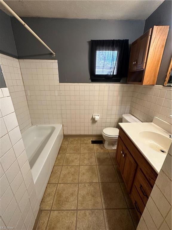Full bathroom featuring toilet, tile walls, shower