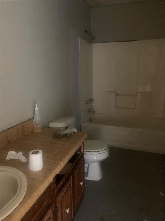 Bathroom featuring tile patterned flooring, toilet