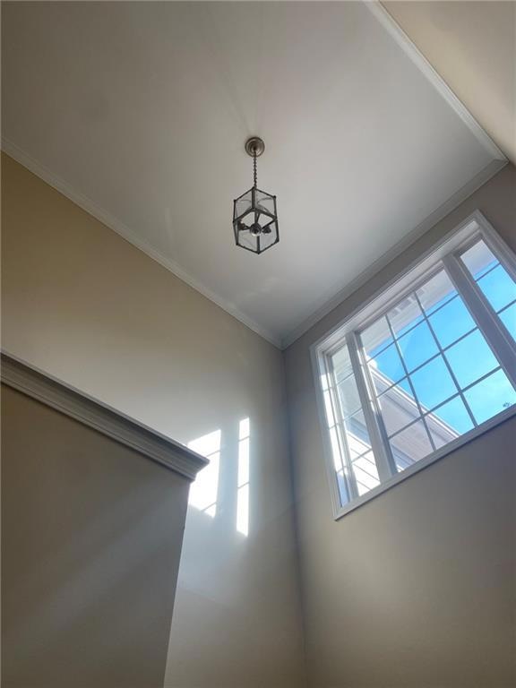 Interior details featuring crown molding