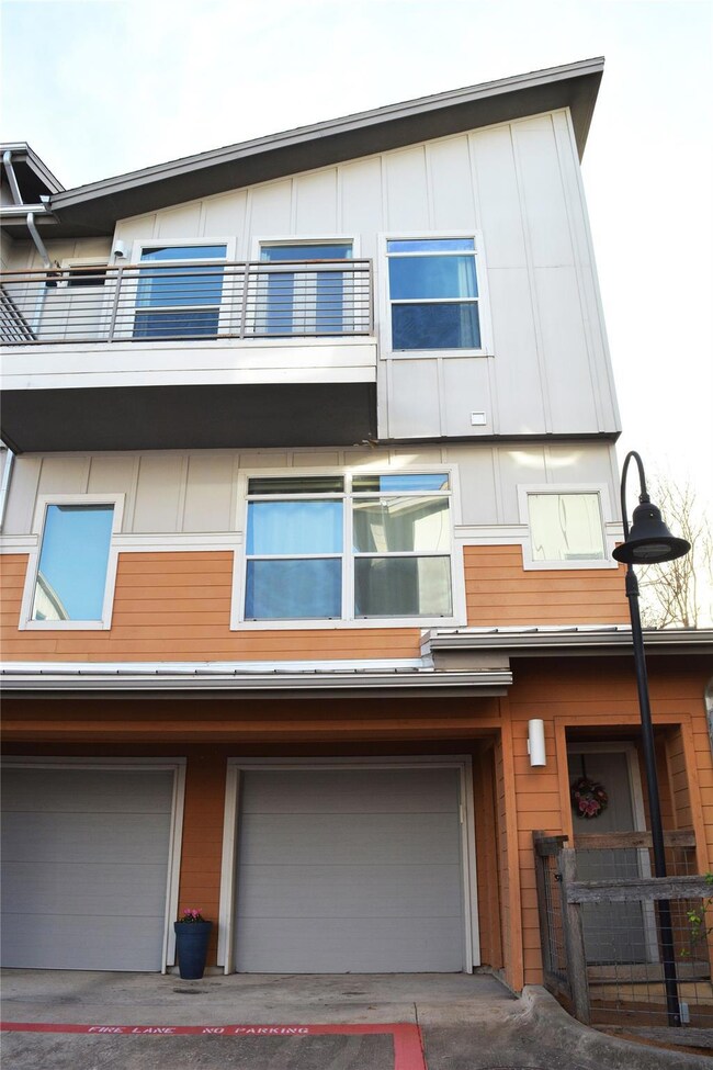 View of front of property featuring board and bat